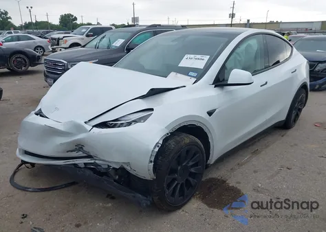 2023 Tesla Model Y from USA, damaged, VIN 7SAYGDEE4PA044024